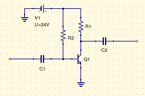 Transistor amplifier with AC coupling capacitors at input and output