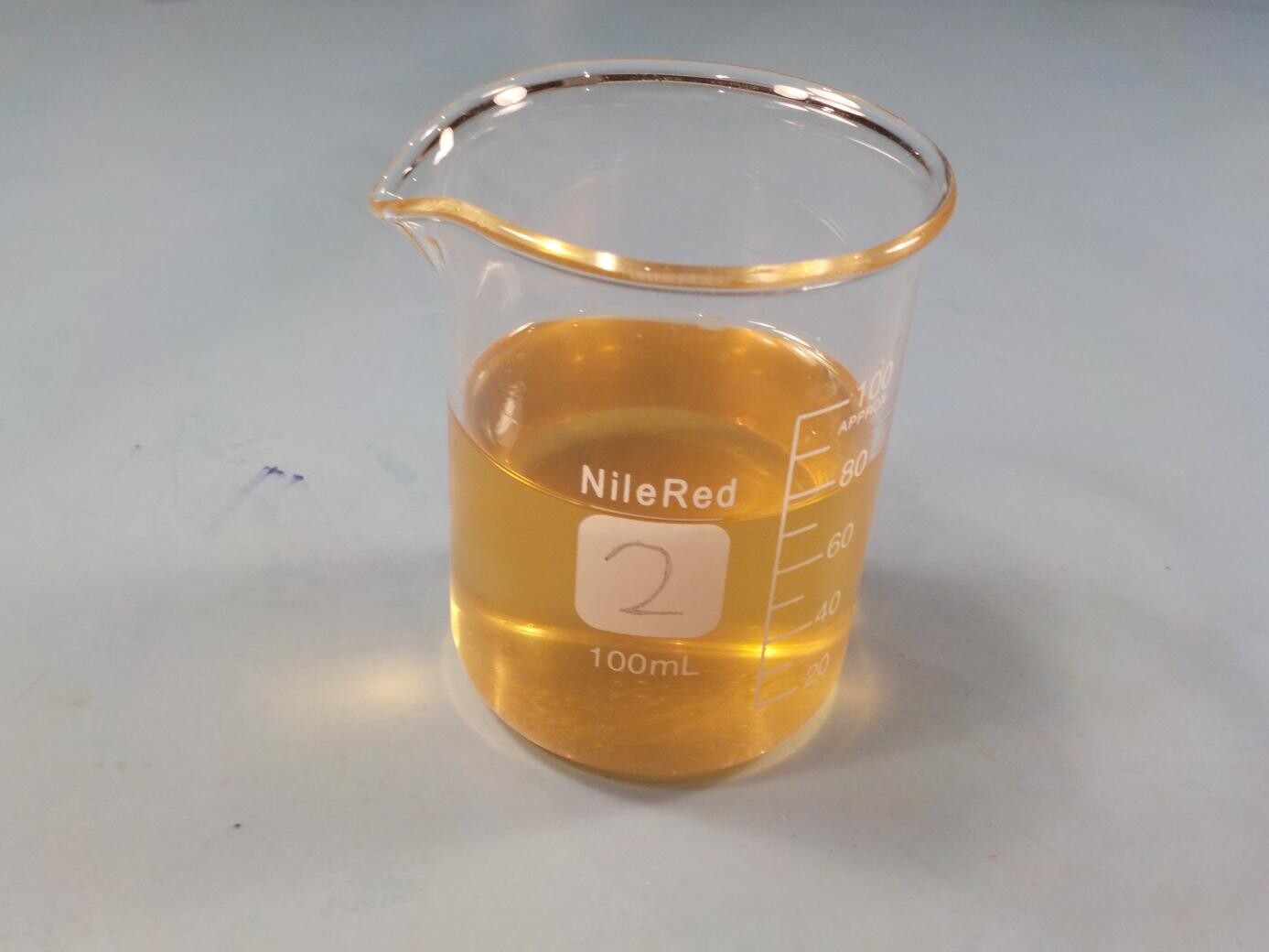beaker containing dissolved resin