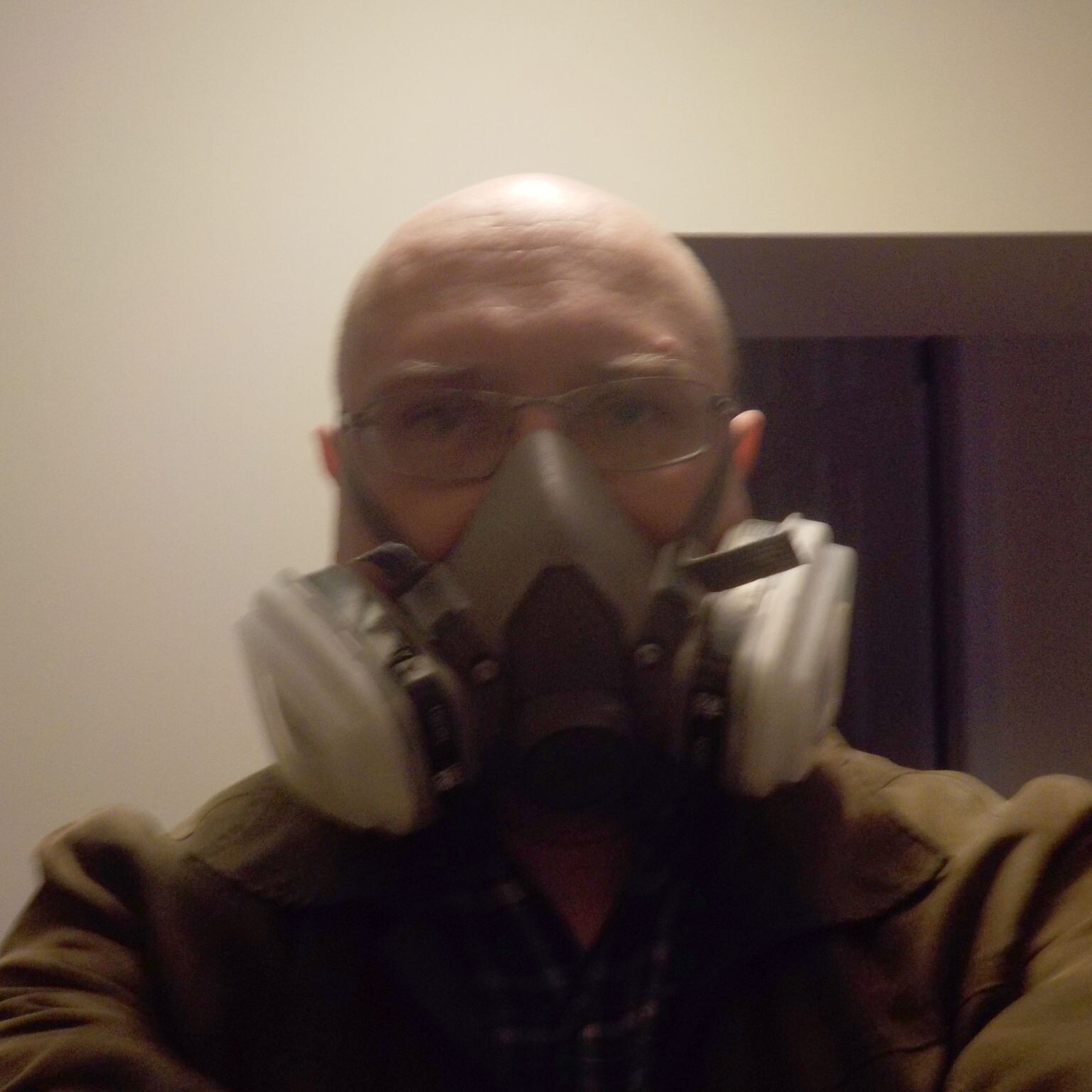 Matt wearing a half-face organic vapour respirator