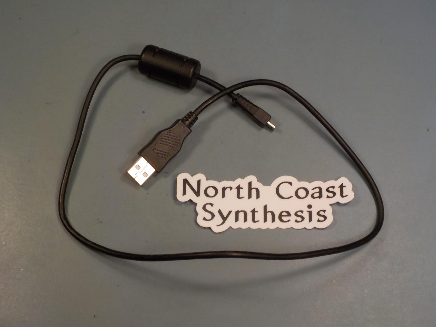 USB cable with a ferrite filter